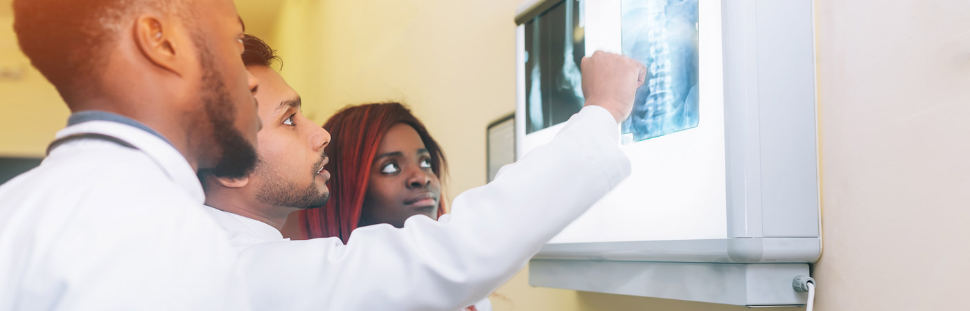 doctors looking at X-ray